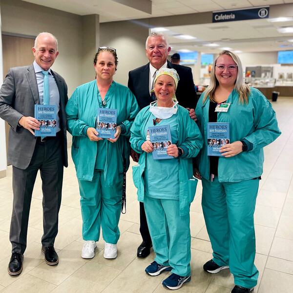Touching messages of gratitude penned in books delivered to local healthcare heroes